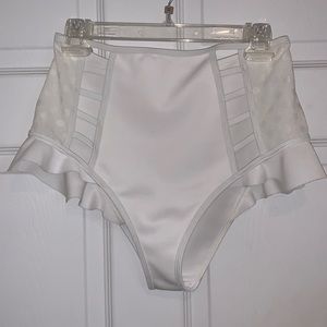 White high waisted swimsuit bottoms.